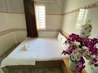 Photos of Collection O District 12 - Mau Tim Hotel