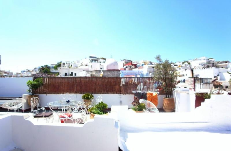The rooftop lounge on top the Melting Pot hostel in Tangier, Morocco on a beautiful summers day.