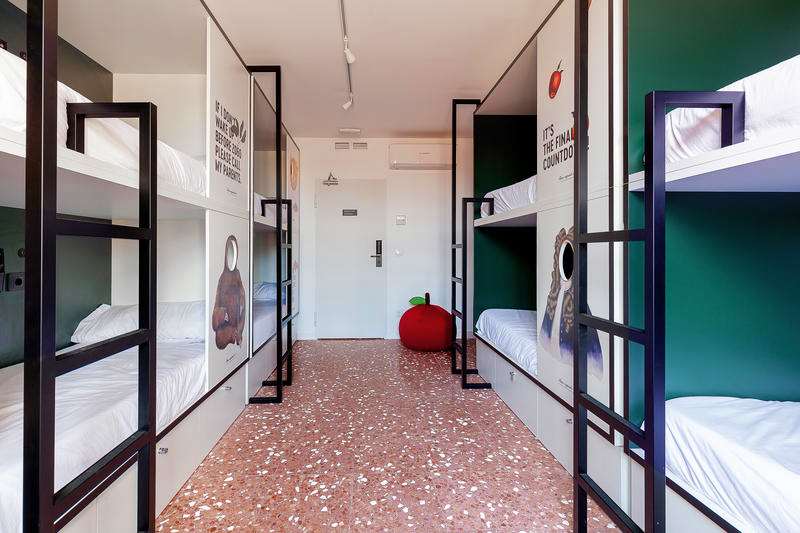 Literas en habitación compartida, 2060 The Newton Hostel [Foto: Hostelworld]